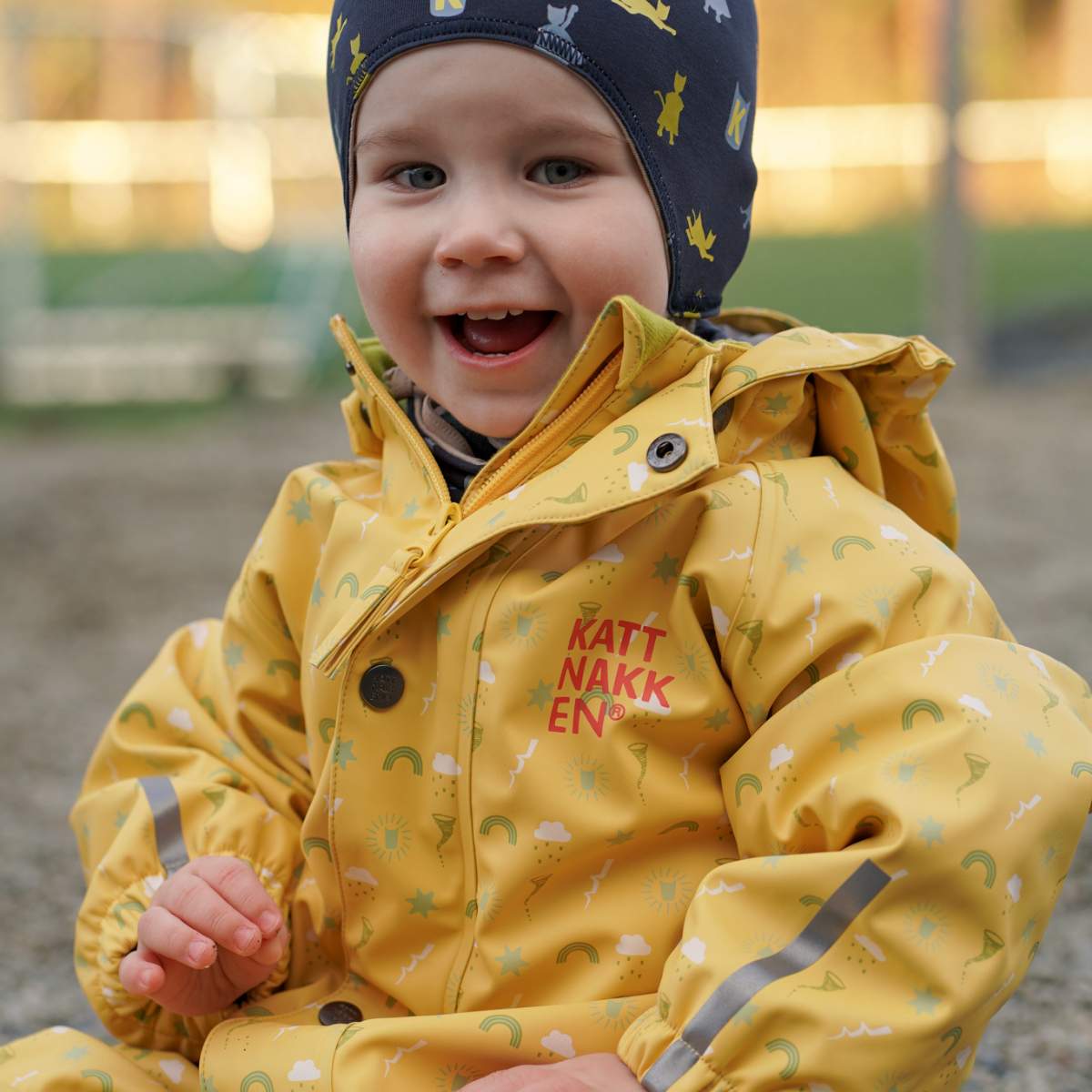 Kattnakken - Babyregndress Dugg Bananskum